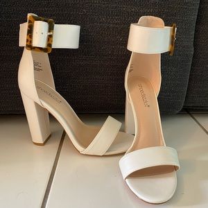 High heeled shoes